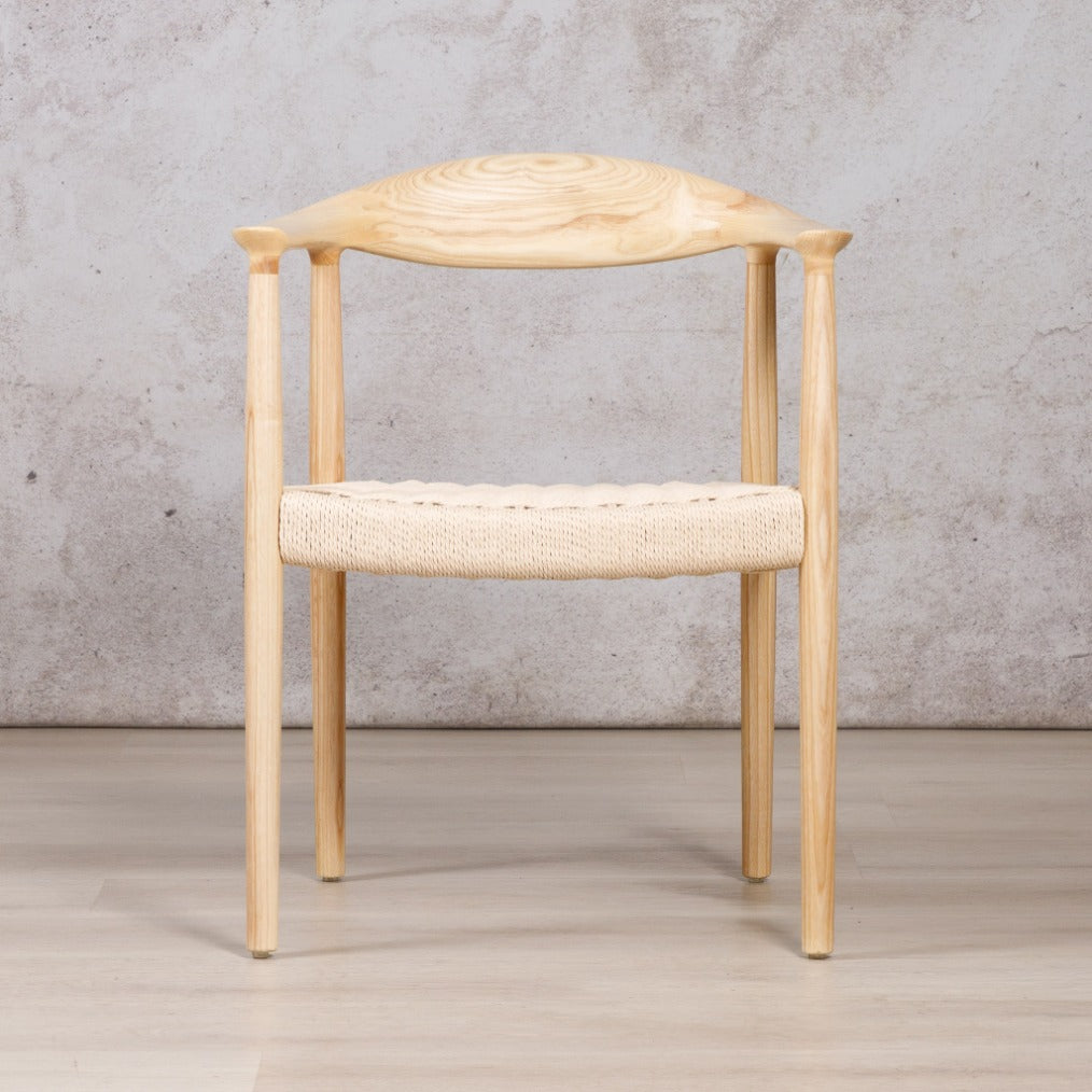 Easton wood dining chair featuring a natural ash wood frame and a textured, handwoven rope seat. dining chairs, modern dining chairs, armchairs