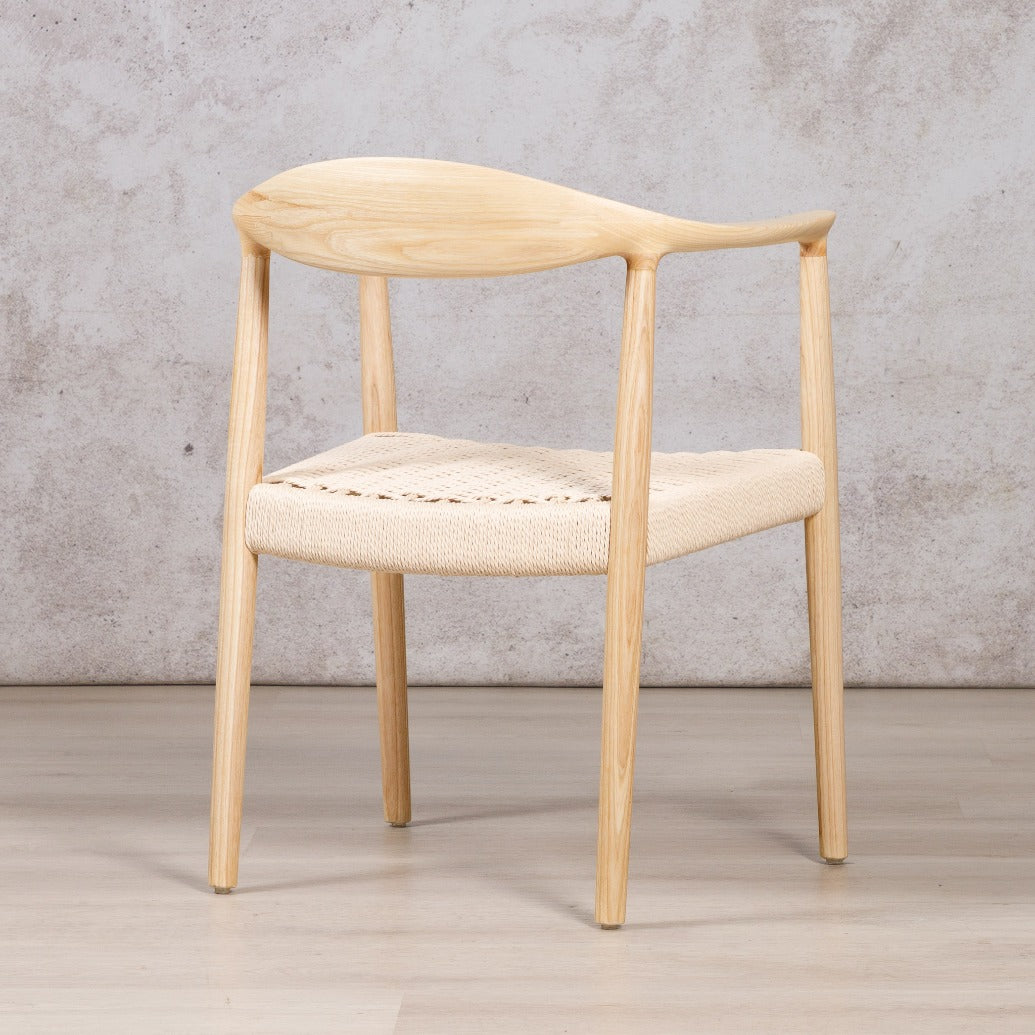 Easton wood dining chair featuring a natural ash wood frame and a textured, handwoven rope seat. dining chairs, modern dining chairs, armchairs 