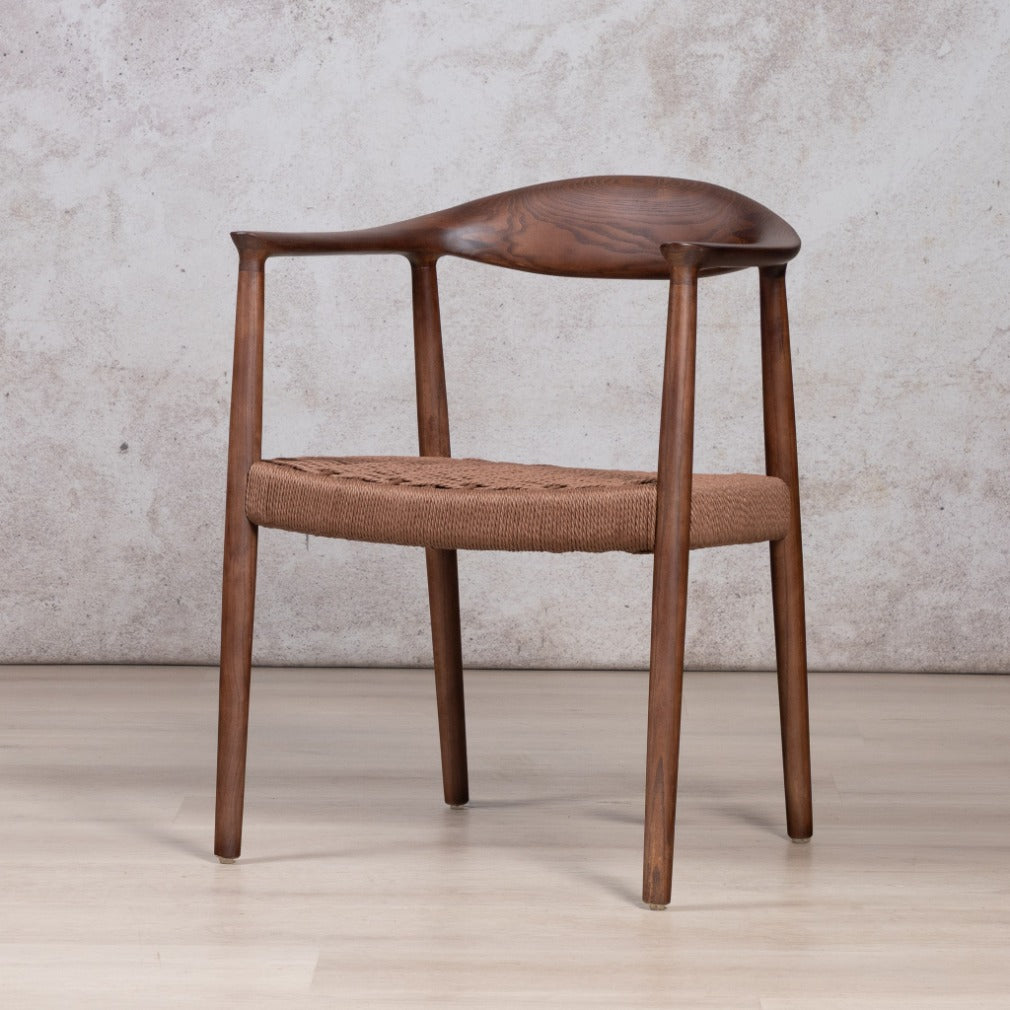 Easton wood dining chair featuring a walnut wood frame and a textured, handwoven rope seat. dining chairs, modern dining chairs, armchairs