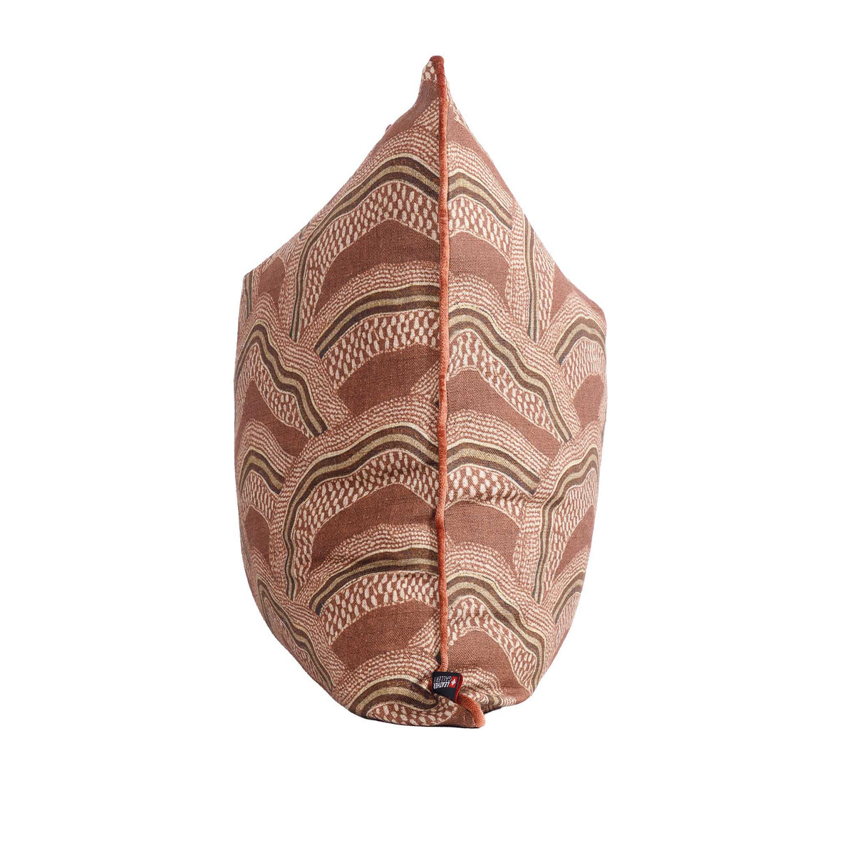 Leather Gallery Ember Terrain Cushion in Seal Brown, featuring a rust-brown and beige wavy geometric pattern.