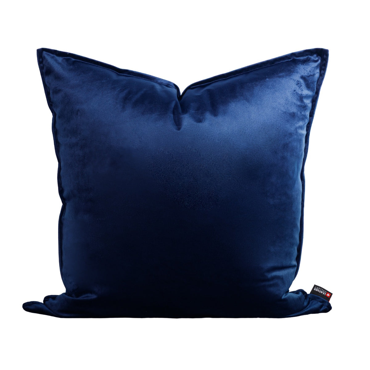 Leather Gallery Fluxx Navy Blue Cushion 59cm x 59cm, featuring soft velvet upholstery and a branded woven tag.