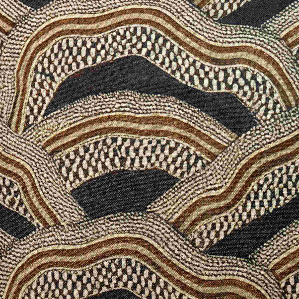 Close-up of the Leather Gallery Imperial Partridge Cushion in Volcanic Ash, showing the woven fabric and abstract wave pattern.