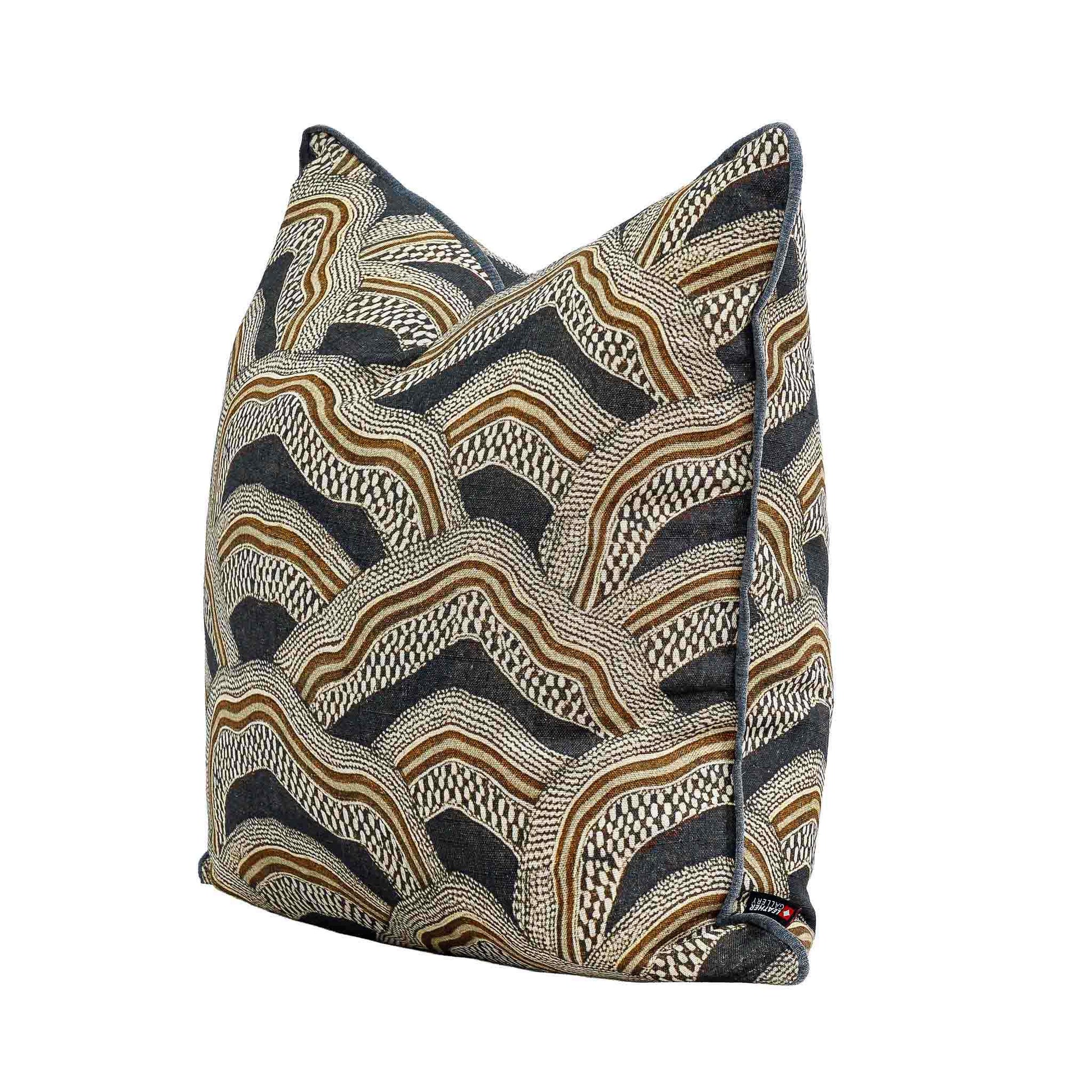 Leather Gallery Imperial Partridge Cushion in Volcanic Ash, featuring a geometric wave pattern with dark piping.