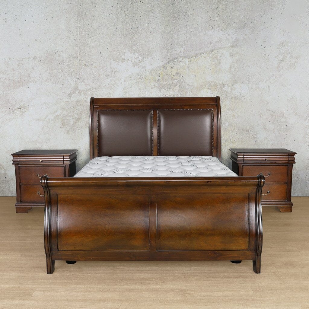 Experience the elegance of the Kingsley 3-piece bedroom suite, complete with a unique headboard featuring leather panels and metal stud details.