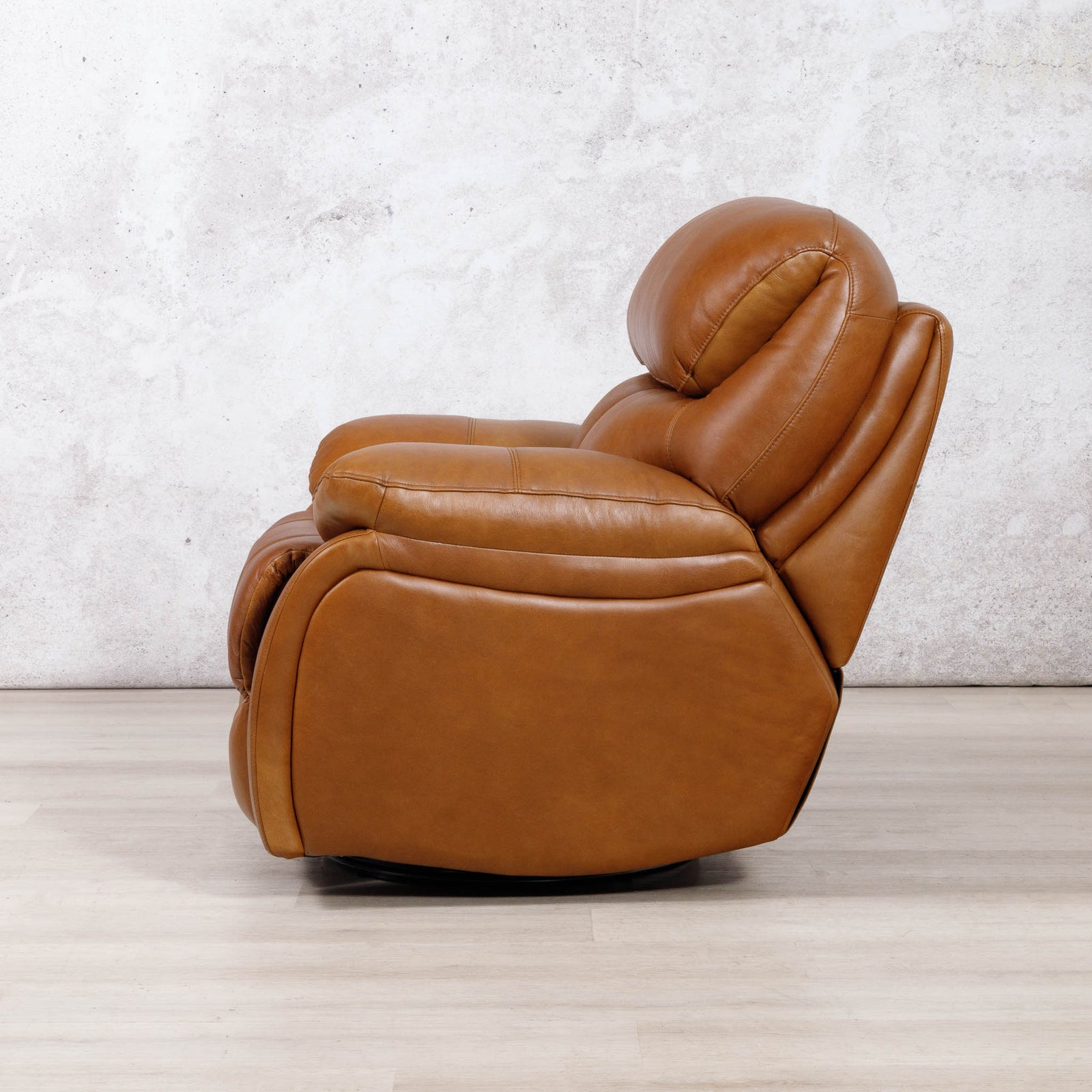 Side view of the Leather Gallery Kuta 1 Seater Leather Recliner in Czar Pecan, showing its leather upholstery and recliner profile.