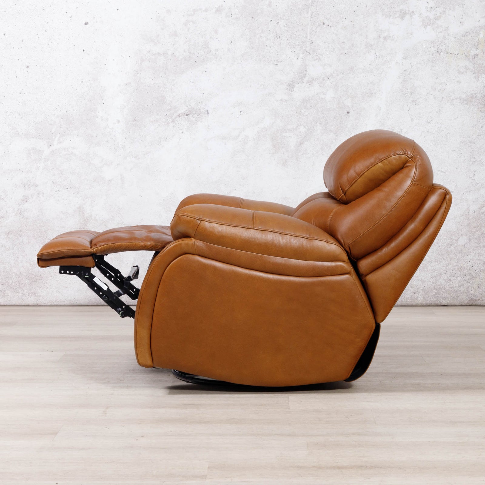 Leather Gallery Kuta 1 Seater Leather Recliner in Czar Pecan, featuring leather upholstery and a swivel base.