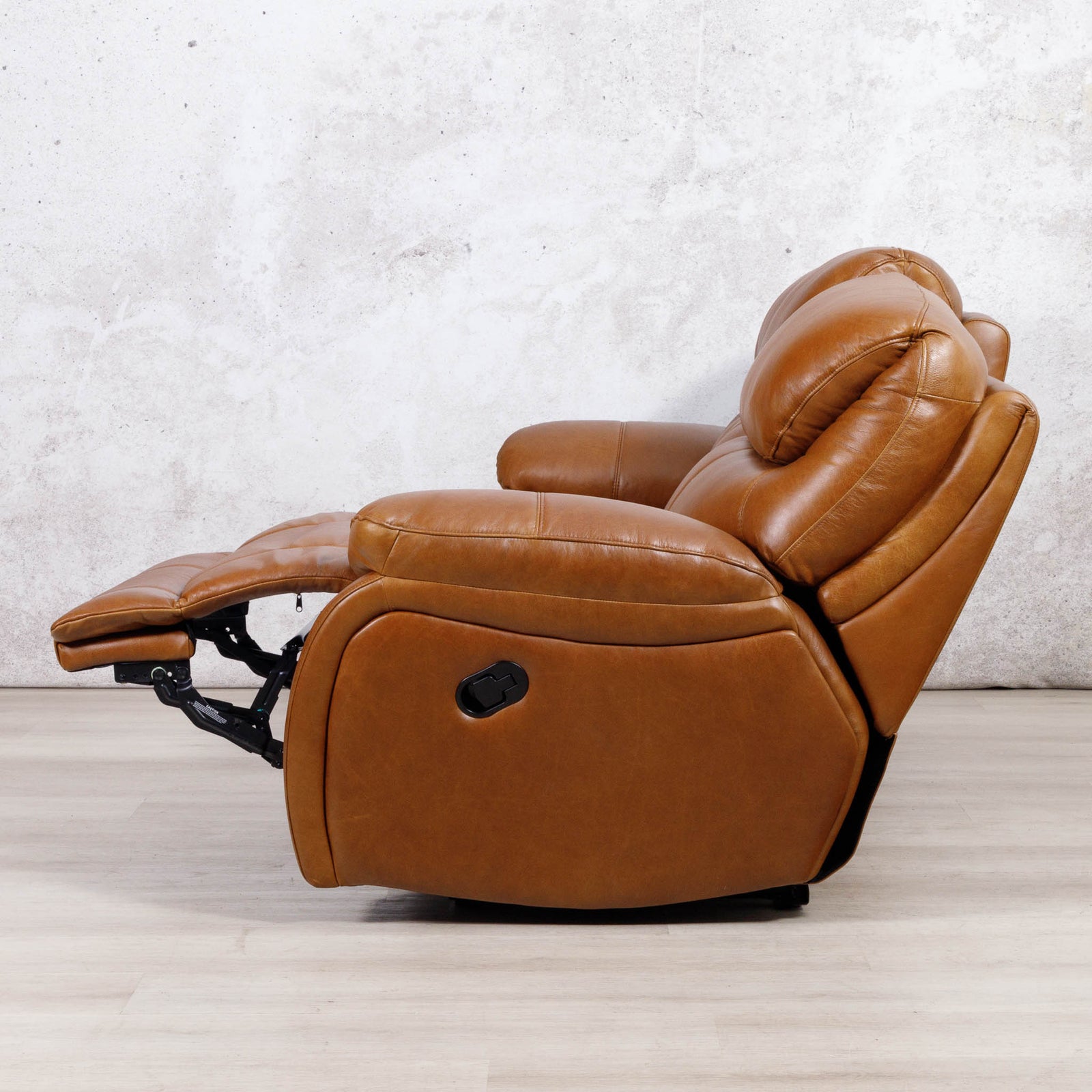 Leather Gallery Kuta 3 Seater Leather Recliner in Czar Pecan, shown with the footrest extended.