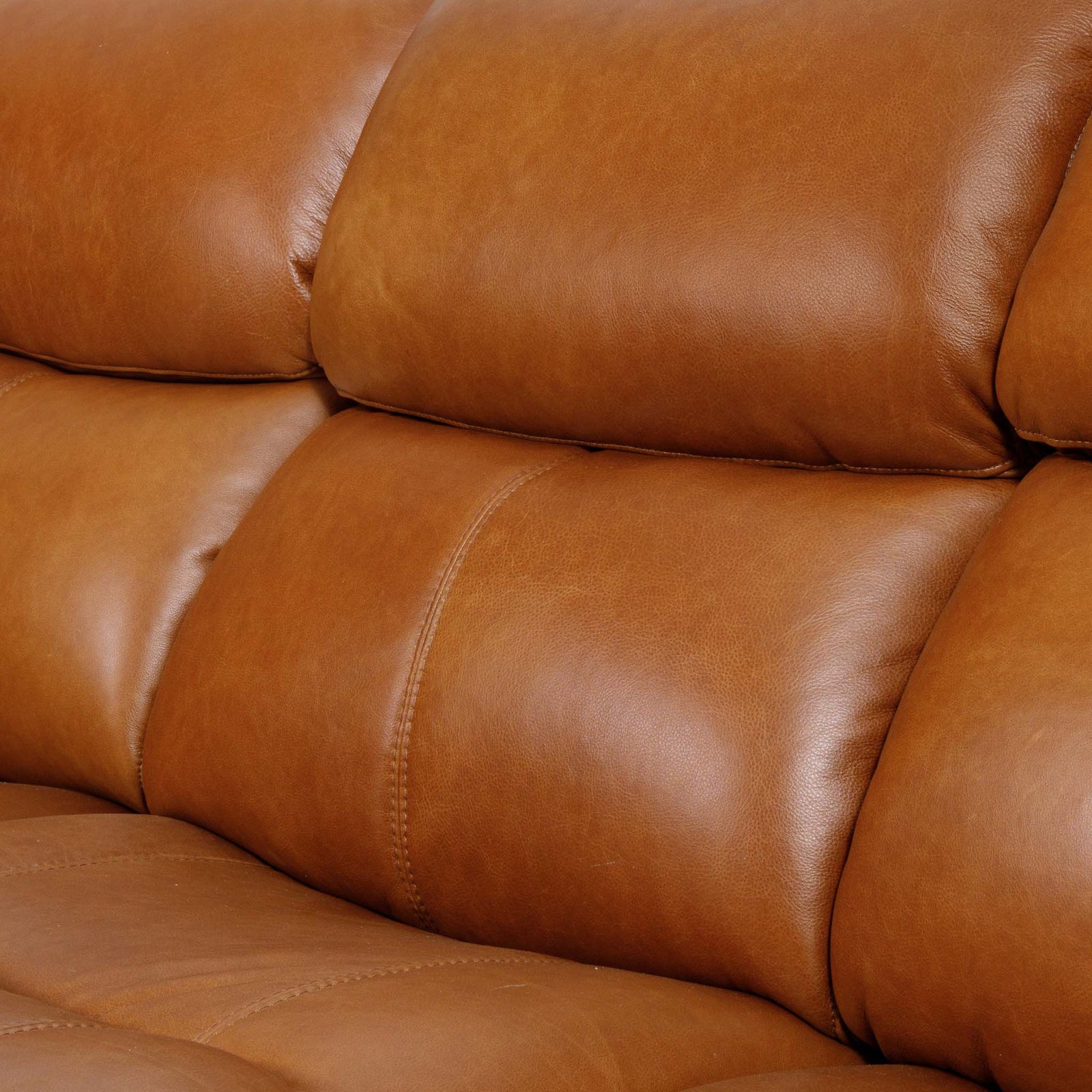 Close-up of the Leather Gallery Kuta 3 Seater Leather Recliner in Czar Pecan, showing tufted leather cushions and visible stitching.