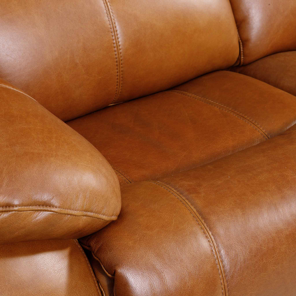 Close-up of the Leather Gallery Kuta 3 Seater Leather Recliner in Czar Pecan, showing the seat cushion, backrest, armrest, and natural leather texture.
