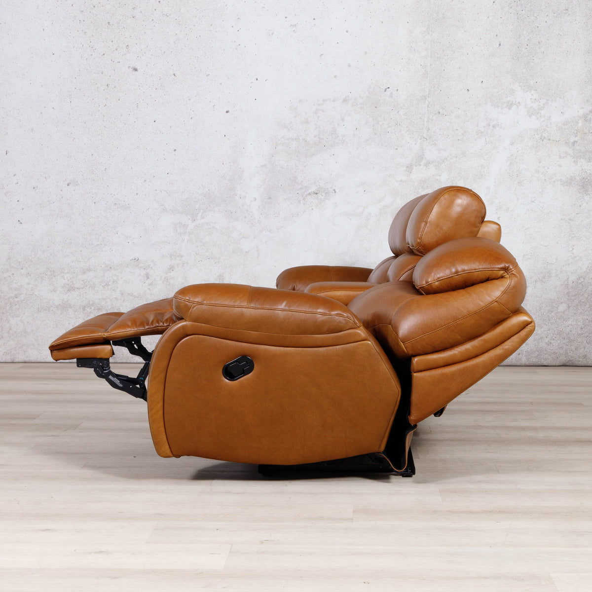 Side view of the Leather Gallery Kuta 2 Seater Leather Recliner Home Theatre in Czar Pecan, shown reclined with the footrest extended.
