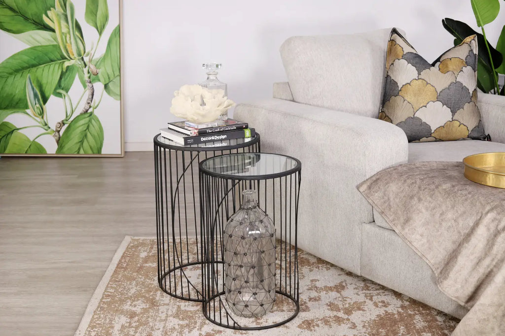 Add a touch of modern elegance to your bedroom with the Lapu Occasional Nesting Side Table Set. 