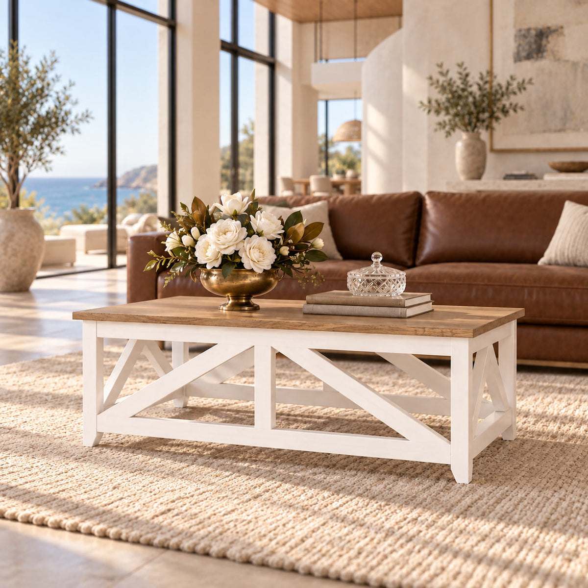 Front view of the Louvre Coffee Table, showcasing its Oakwood tabletop and white base with rustic natural grain detailing