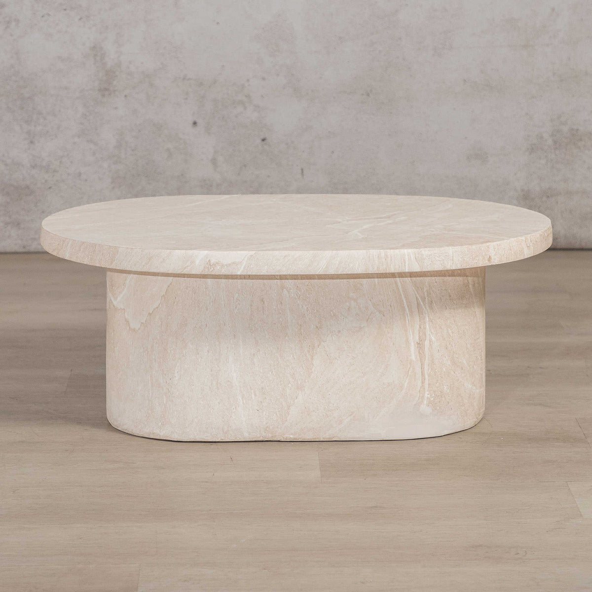 Gallery Everyday Maison Coffee Table in Lunar Quartz, featuring a round marble-look top styled in a modern living room.