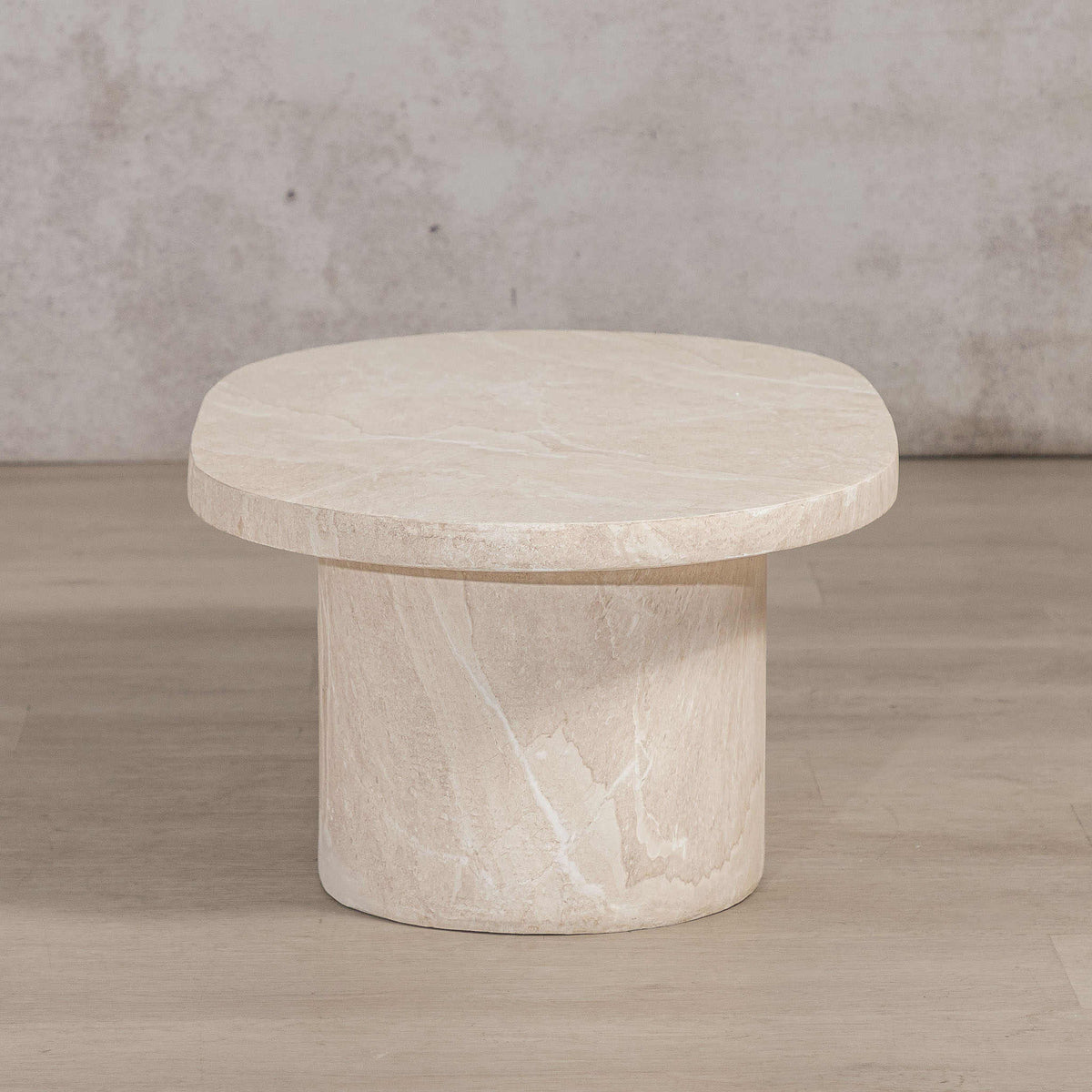 Gallery Everyday Maison Coffee Table in Lunar Quartz, featuring a round marble-look top styled in a modern living room.