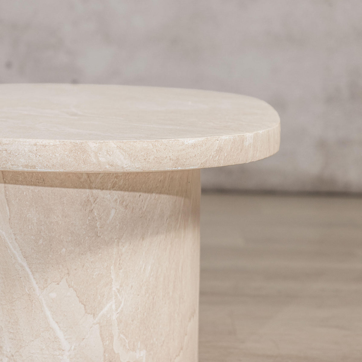 Gallery Everyday Maison Coffee Table in Lunar Quartz, featuring a round marble-look top styled in a modern living room.