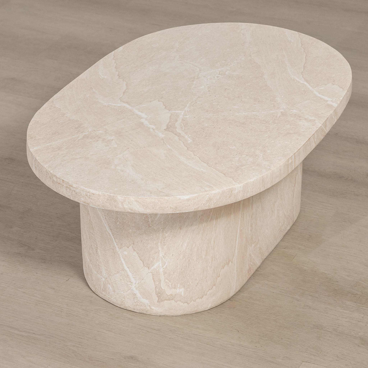 Gallery Everyday Maison Coffee Table in Lunar Quartz, featuring a round marble-look top styled in a modern living room.