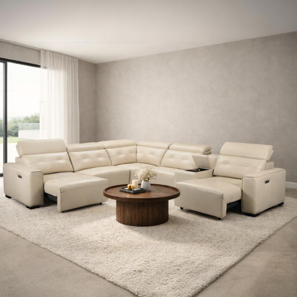 Marbella leather L shaped couch in a cream beige colour, shown in a minimalist lounge setting. | L shape couch, couches for sale, L shape leather couch, beige couch