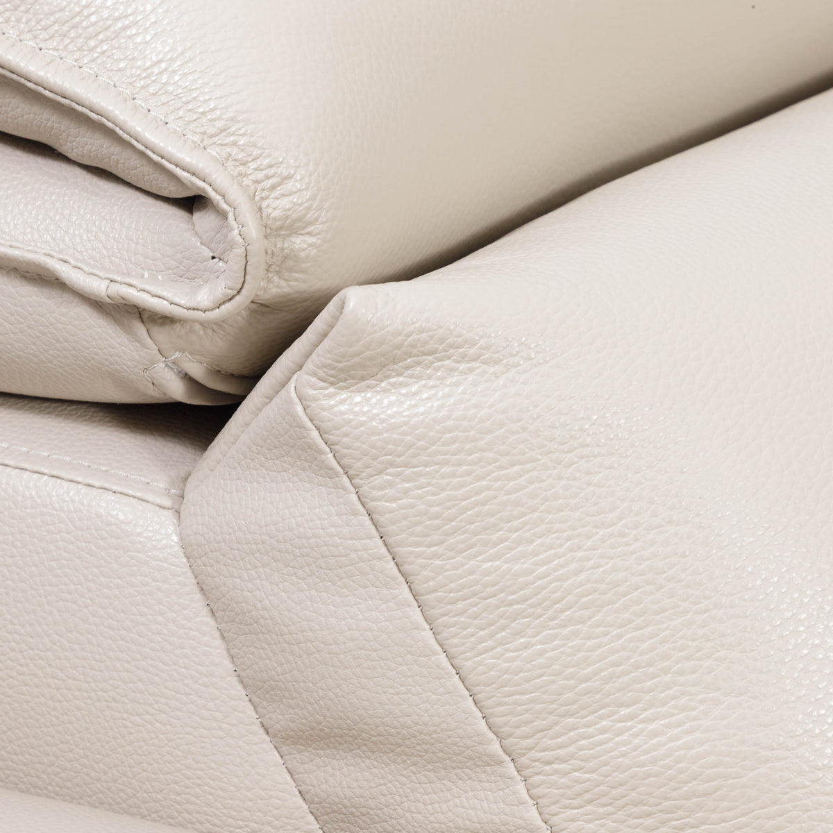 Close-up of the Leather Gallery Marbella 5 Seater Leather L Shape Couch in Cream Beige, showing pebbled leather texture and stitching detail.