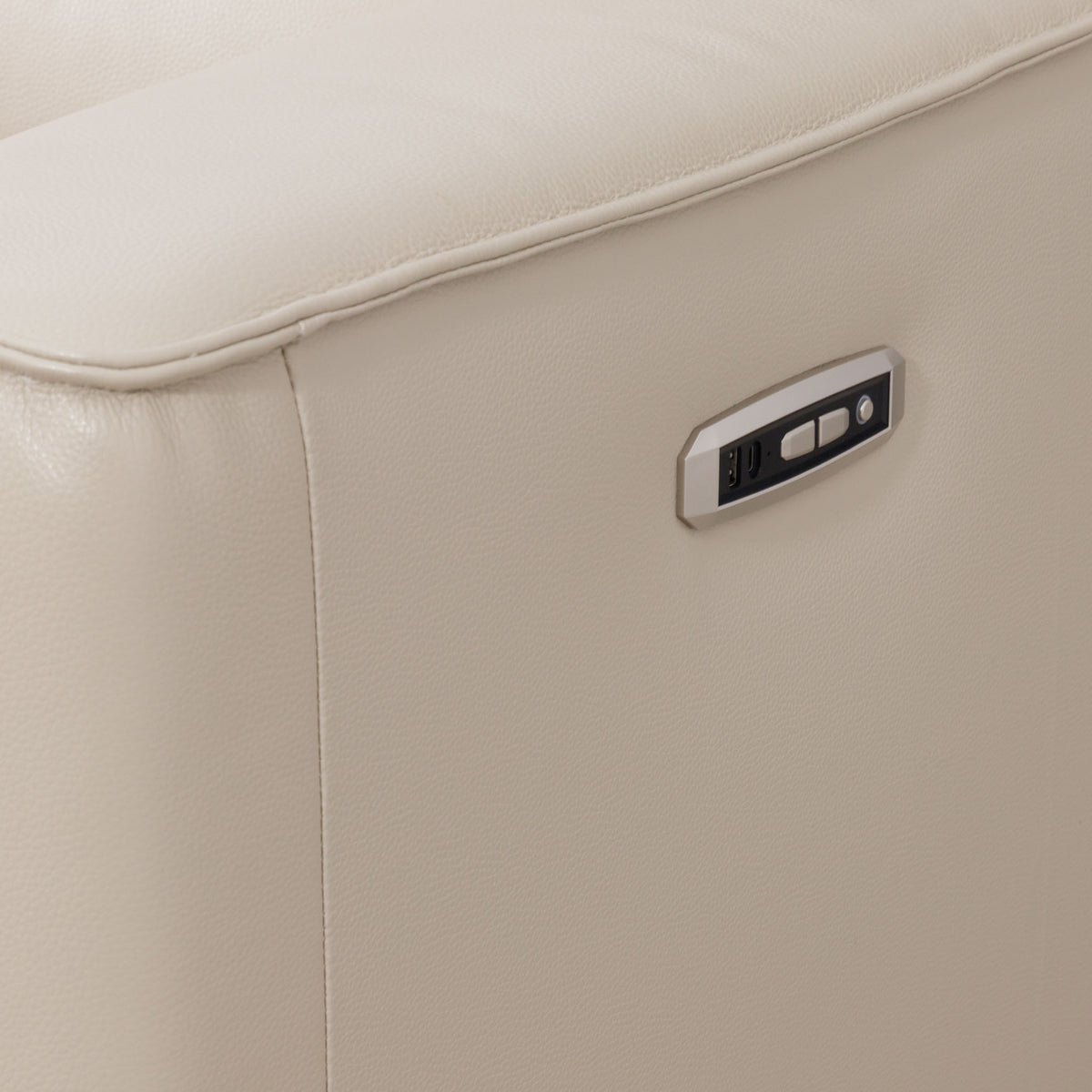 Close-up of the Leather Gallery Marbella 5 Seater Leather L Shape Couch in Cream Beige, showing controls with USB and USB-C charging ports.
