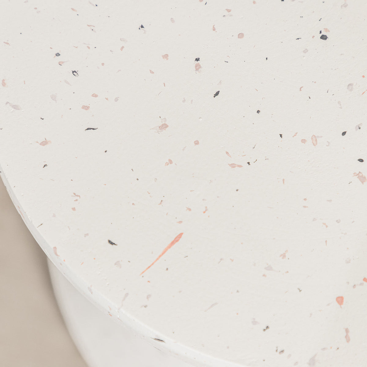 Gallery Everyday Marielle Side Table in Stone, featuring a round concrete design with a speckled beige finish.