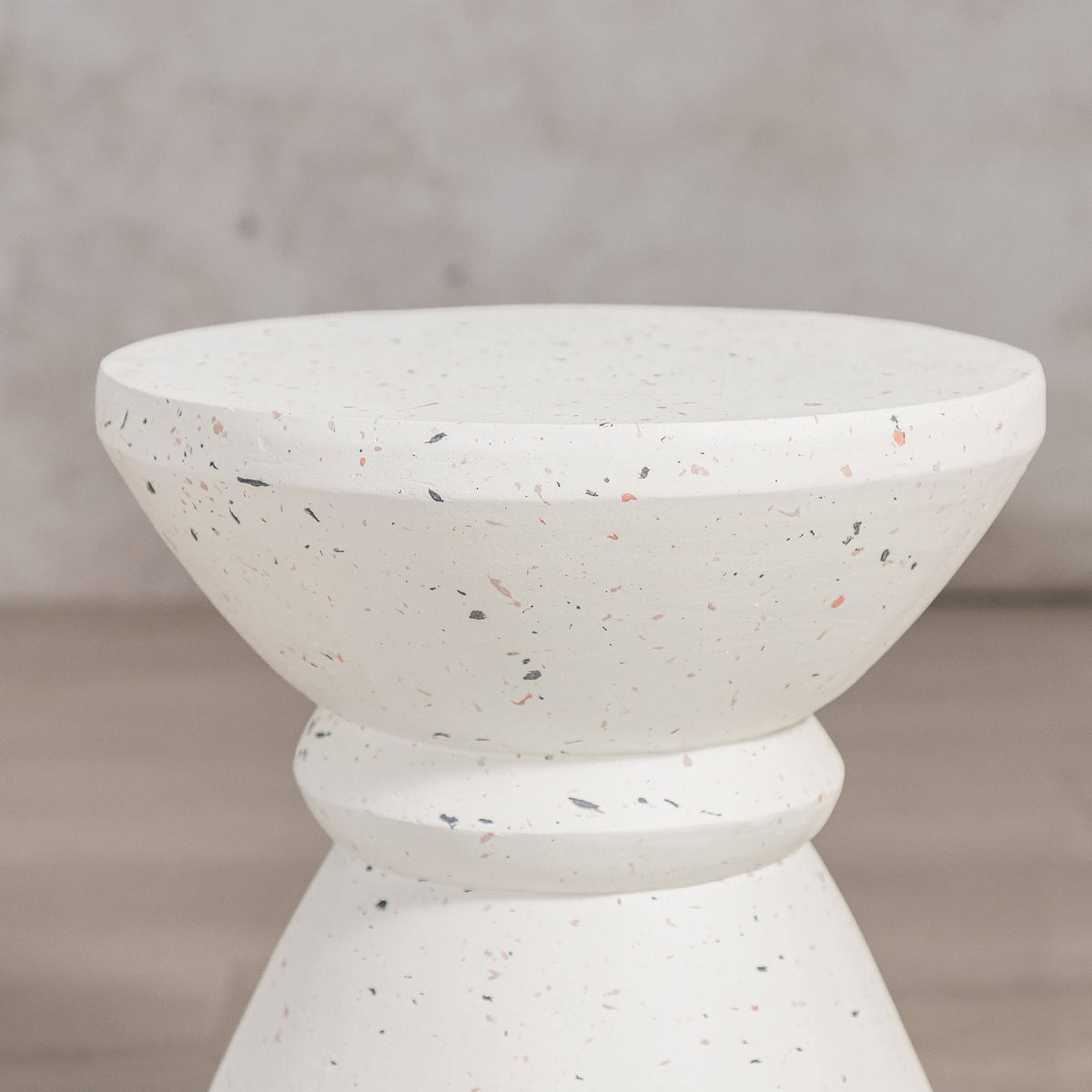 Gallery Everyday Marielle Side Table in Stone, featuring a round concrete design with a speckled beige finish.