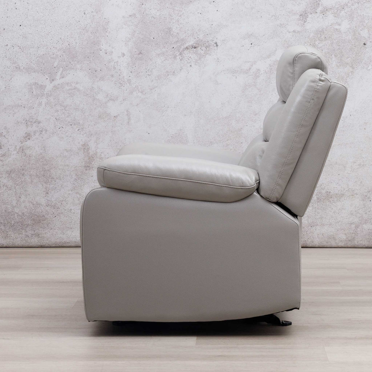 Side view of the Leather Gallery Marino 1 Seater Leather Recliner in Luxe Grey, showing its streamlined profile and leather upholstery.