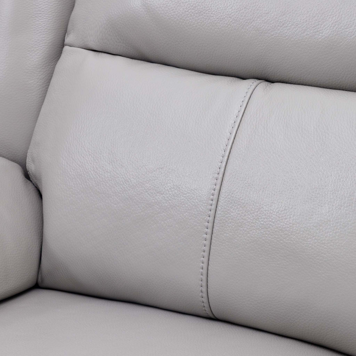 Close-up of the Leather Gallery Marino 1 Seater Leather Recliner in Luxe Grey, showing the cushioned leather surface, visible stitching, and pebbled texture.