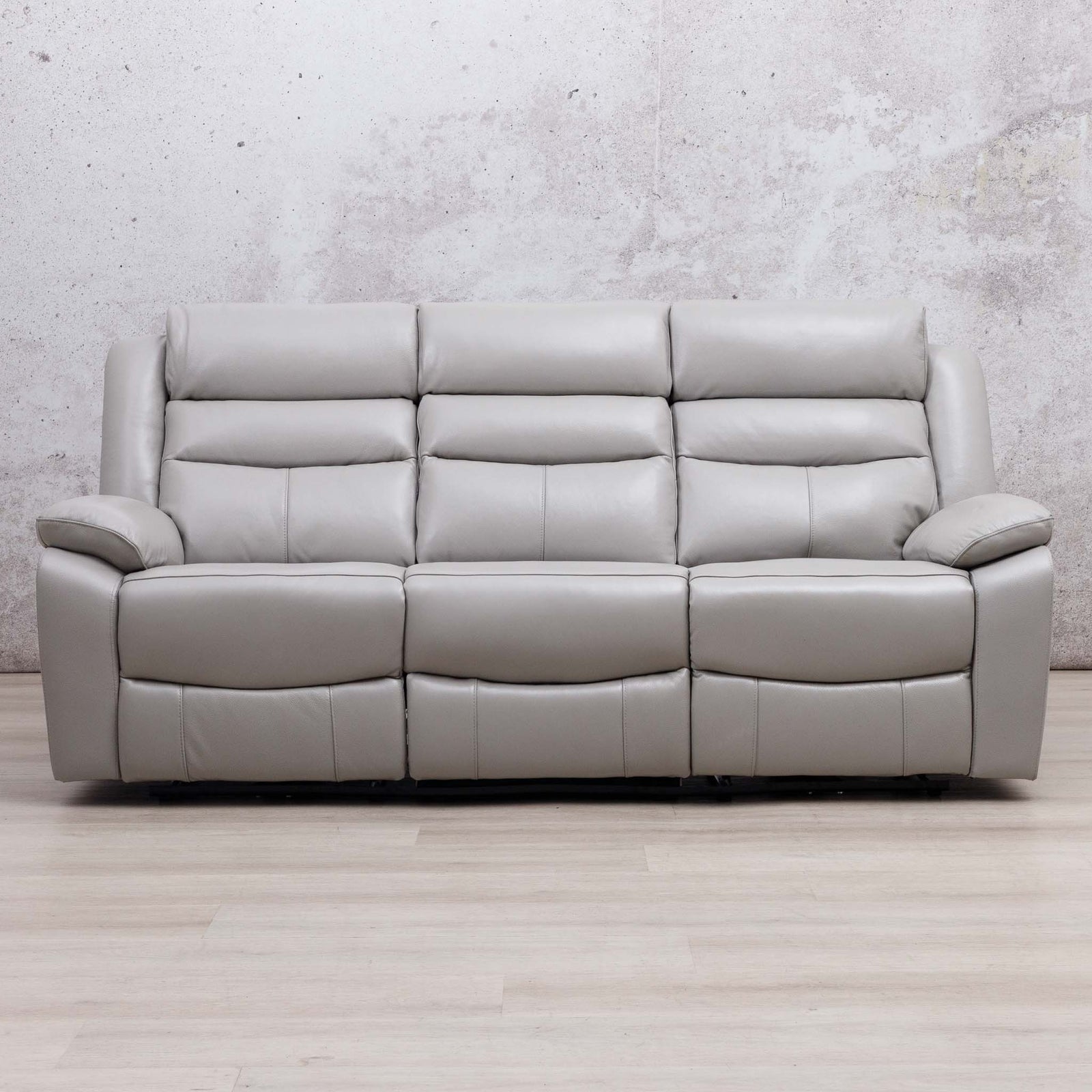 Leather Gallery Marino 3 Seater Leather Recliner in Luxe Grey, featuring padded backrests, armrests and reclining seats.