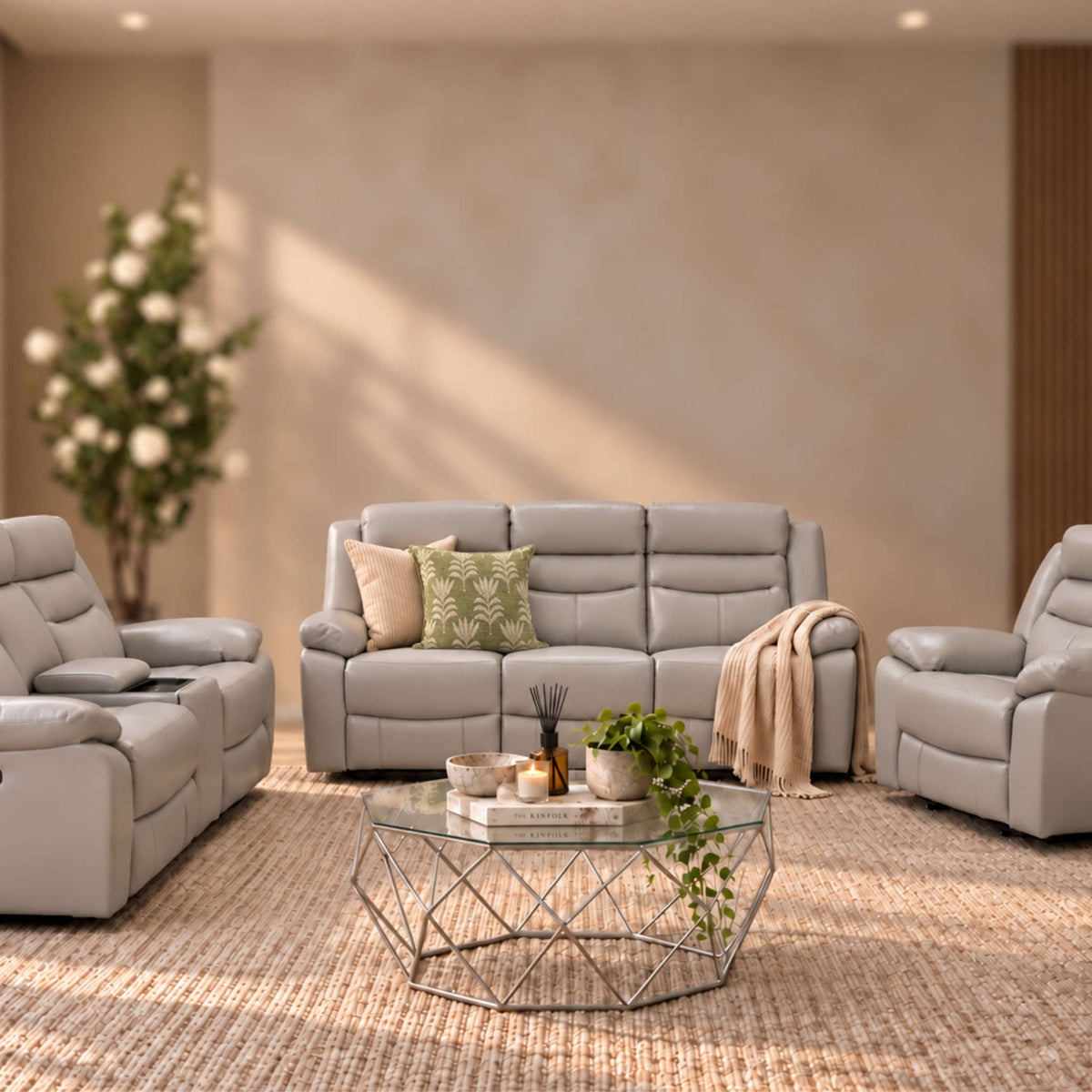 A modern living room scene featuring a coordinated Marino Leather recliner couch set in Luxe Grey. | Home theatre recliners, recliner couches, recliner