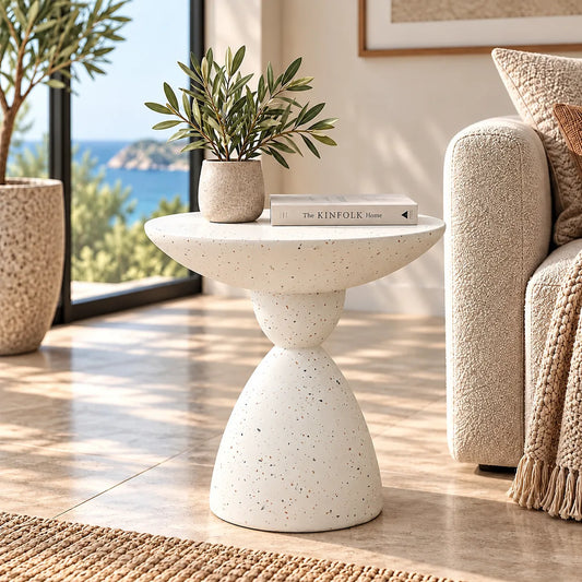 Gallery Everyday Nolli Side Table in Stone, featuring a round speckled top and sculptural bulbous base.