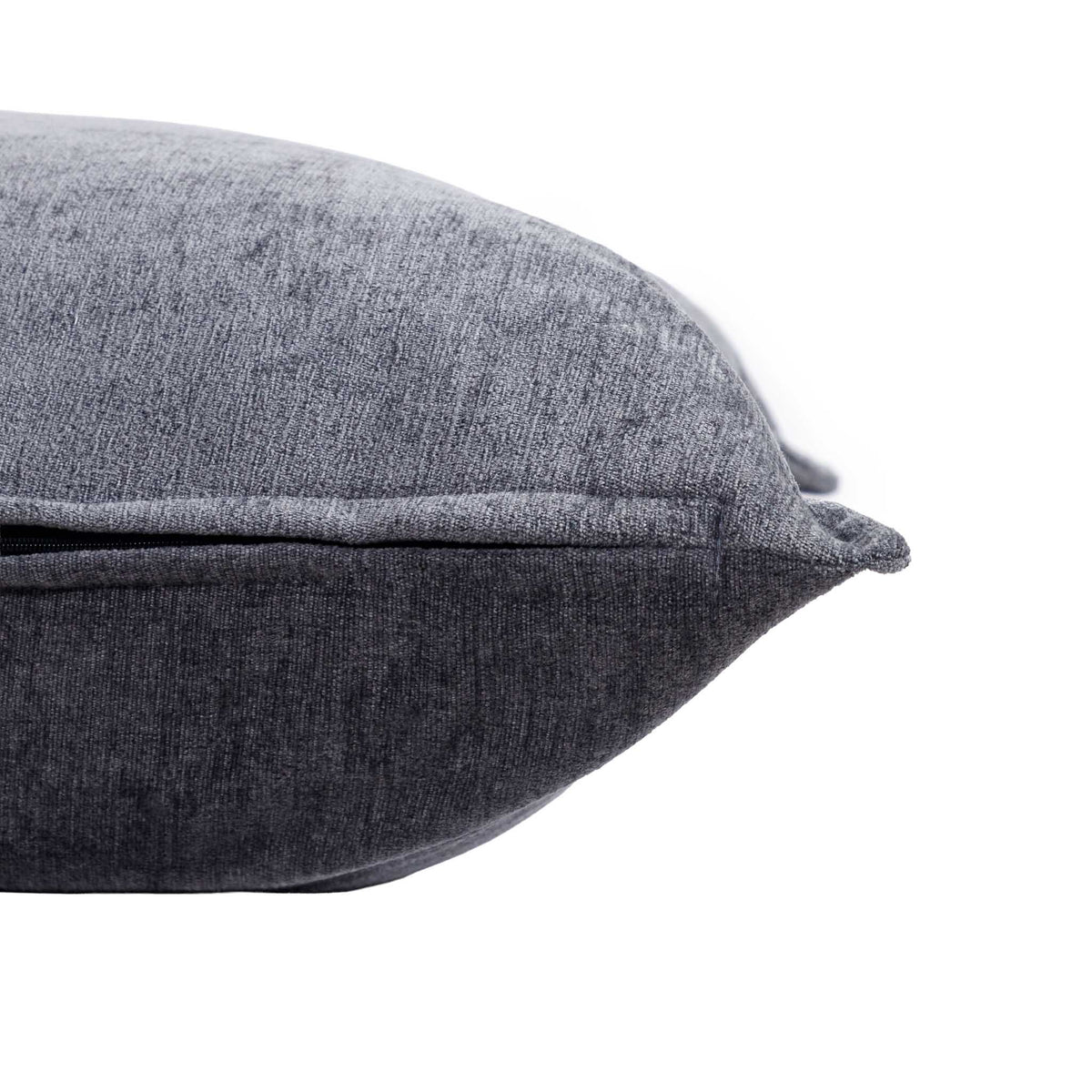 Close-up of the Leather Gallery Obelisk Cushion in Shadow Grey, showing the textured fabric, piped edge, and zippered seam.