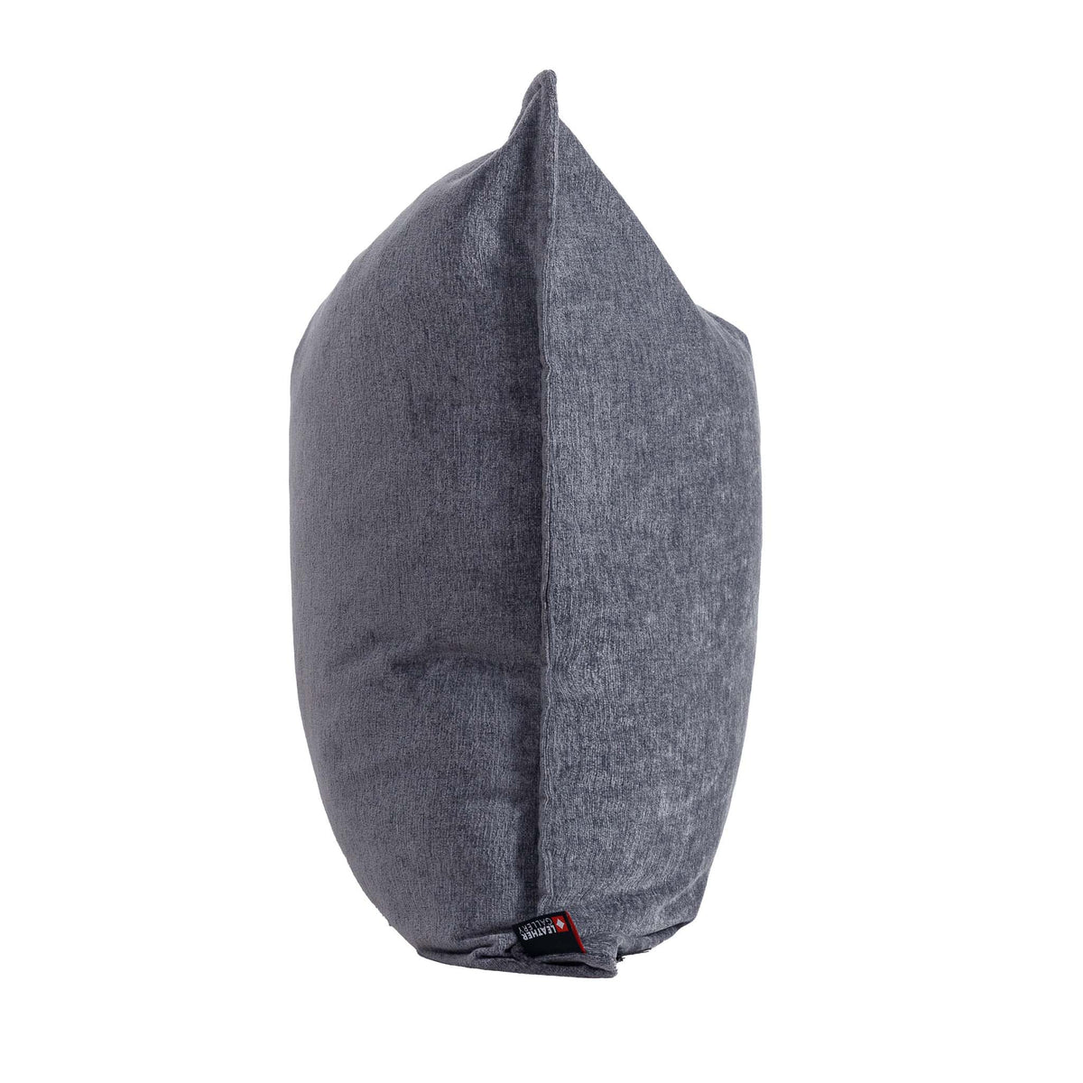 Leather Gallery Obelisk Cushion in Shadow Grey, featuring textured grey fabric with piped edges.