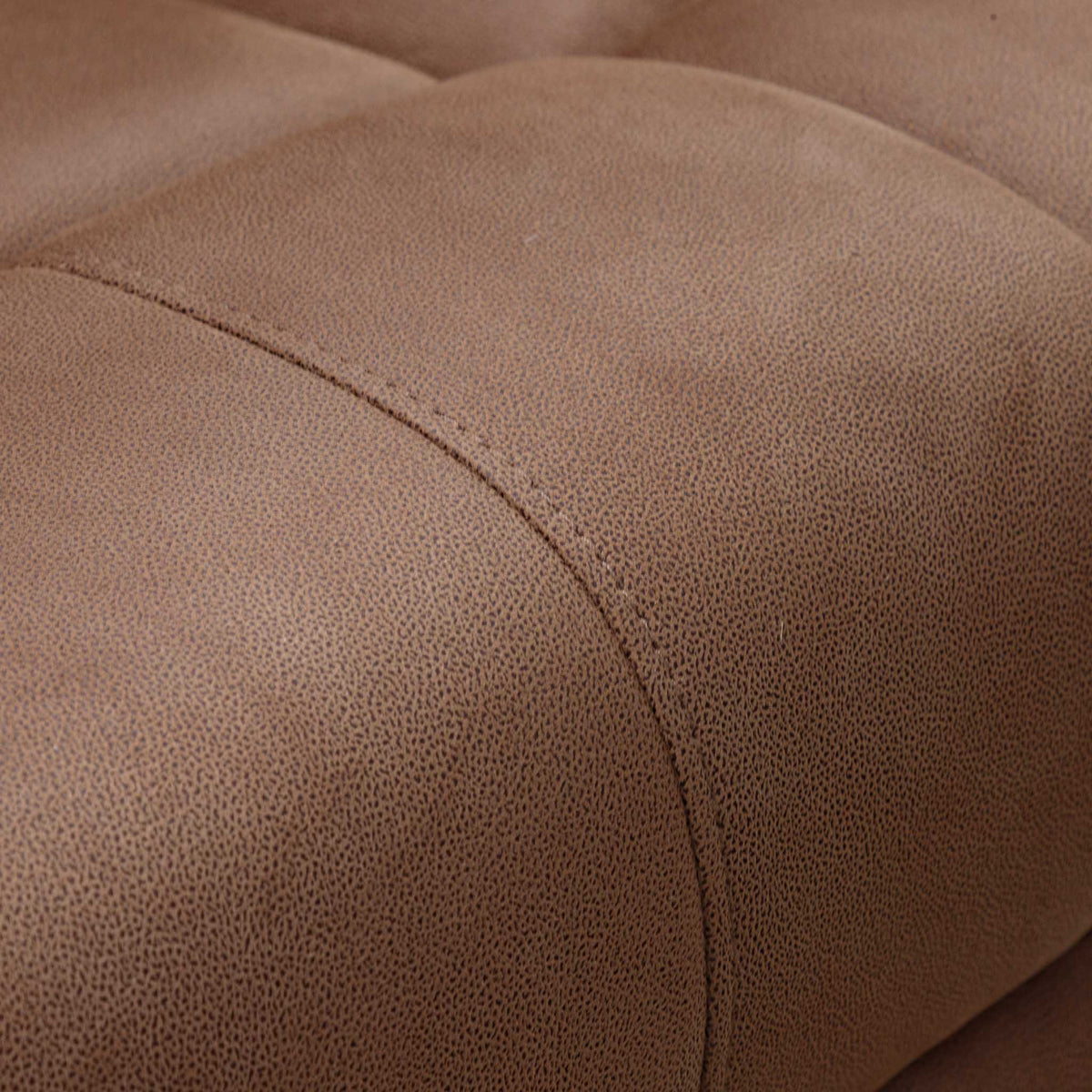 Close-up of the Leather Gallery Orlando 3 Seater Fabric Recliner in Desert Sand, showing textured upholstery, visible stitching, and a tufted seam.