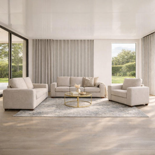 Stanford fabric 3-piece lounge suite in a Pebble colour, shown is a coastal style living room. | lounge suite, fabric couches,  couches for sale, beige couch