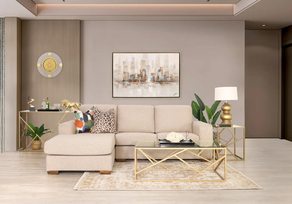 Enhance your home interiors with the Stanford Fabric Chaise Sectional in Kenya Sand, featuring durable polyester fabric and sleek armrests.