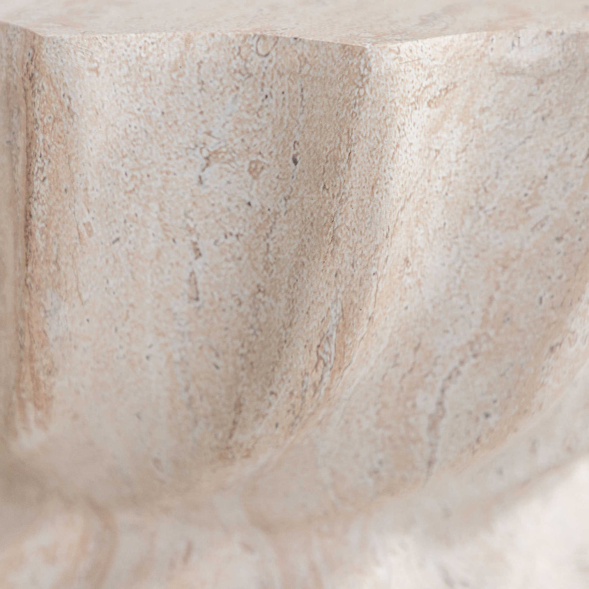 Gallery Everyday Terrena Side Table in Seashell, featuring a sculptural twisted form with a warm cream travertine-look finish.