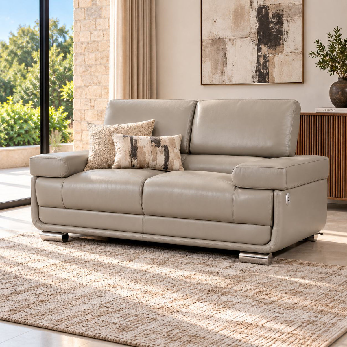 Leather Gallery Tobago 3 Seater Leather Couch in Grey, featuring a low-profile design and polished silver metal legs.