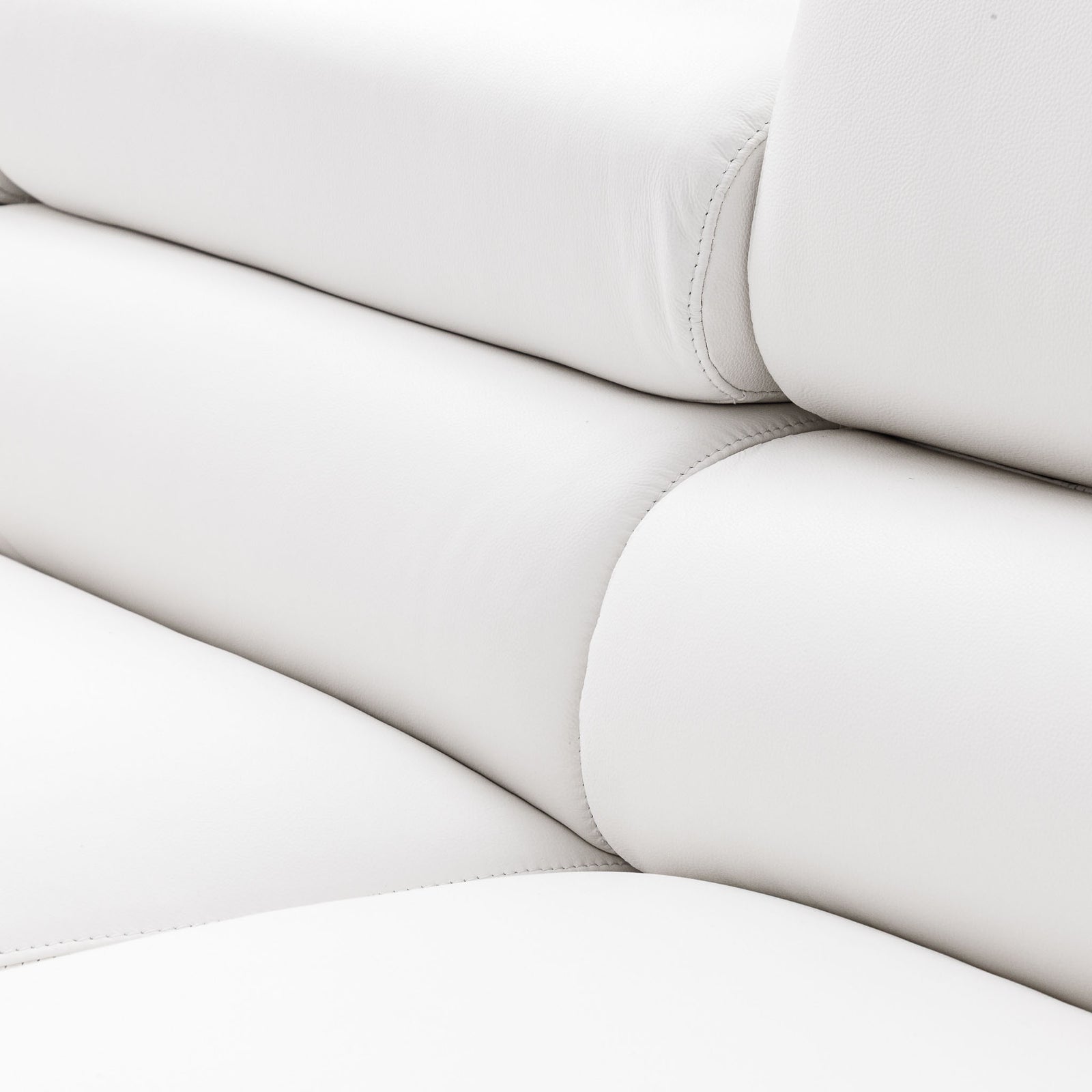 Close-up of the Leather Gallery Tobago 5 Seater L Shape Sectional in white, showing the seat and back cushions with visible stitching.
