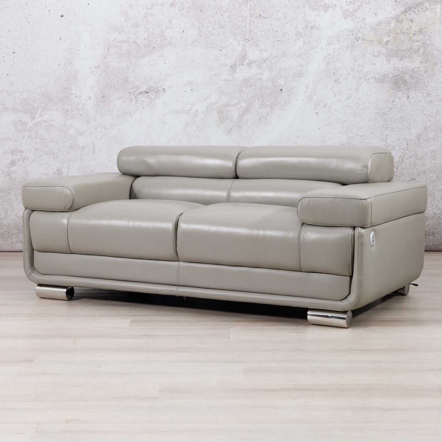 Three-quarter view of the Leather Gallery Tobago 2 Seater Leather Couch in Grey, showing its modern leather upholstery and low-profile design.
