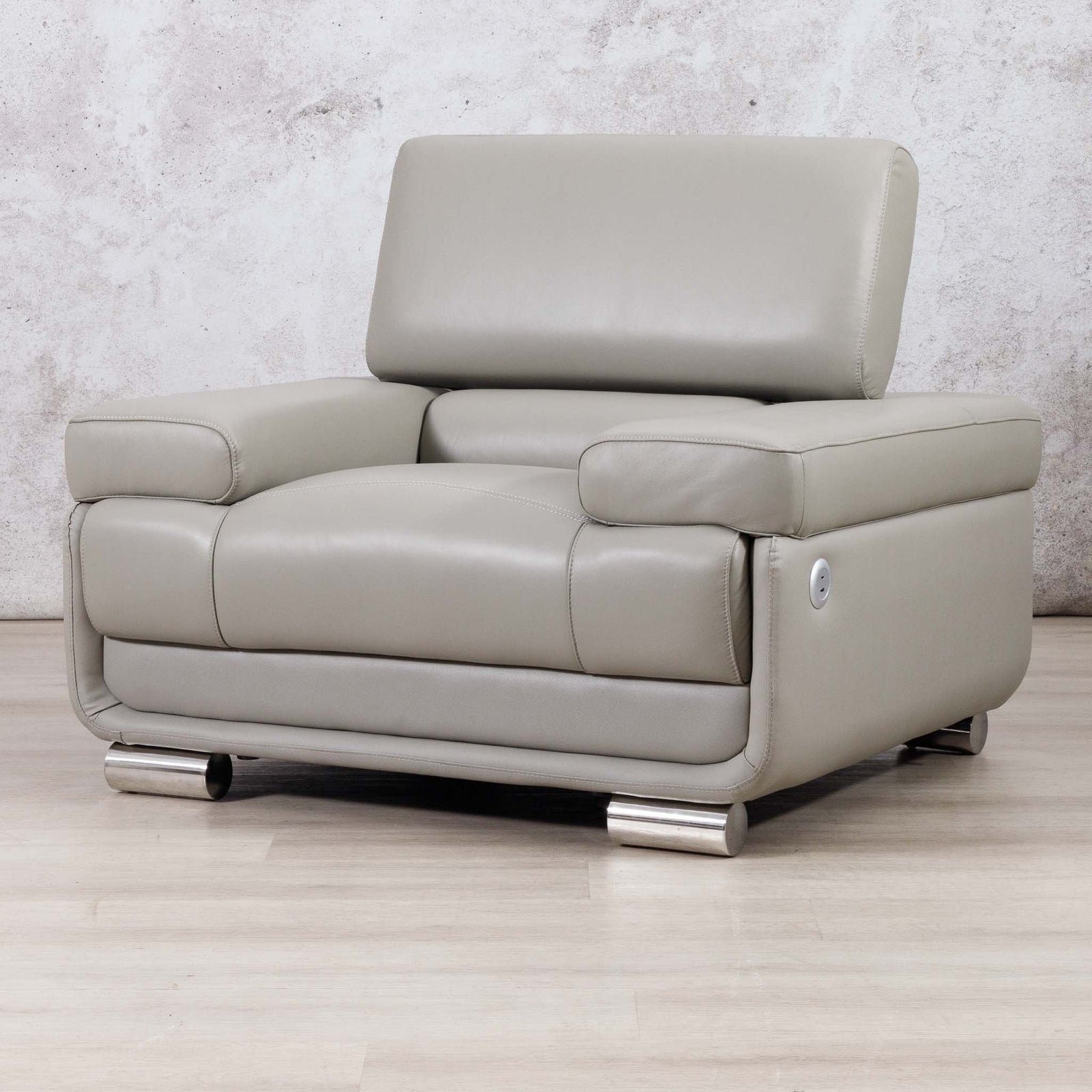 Leather Gallery Tobago 1 Seater Leather Couch in Grey, featuring a low metallic silver base and modern leather design.
