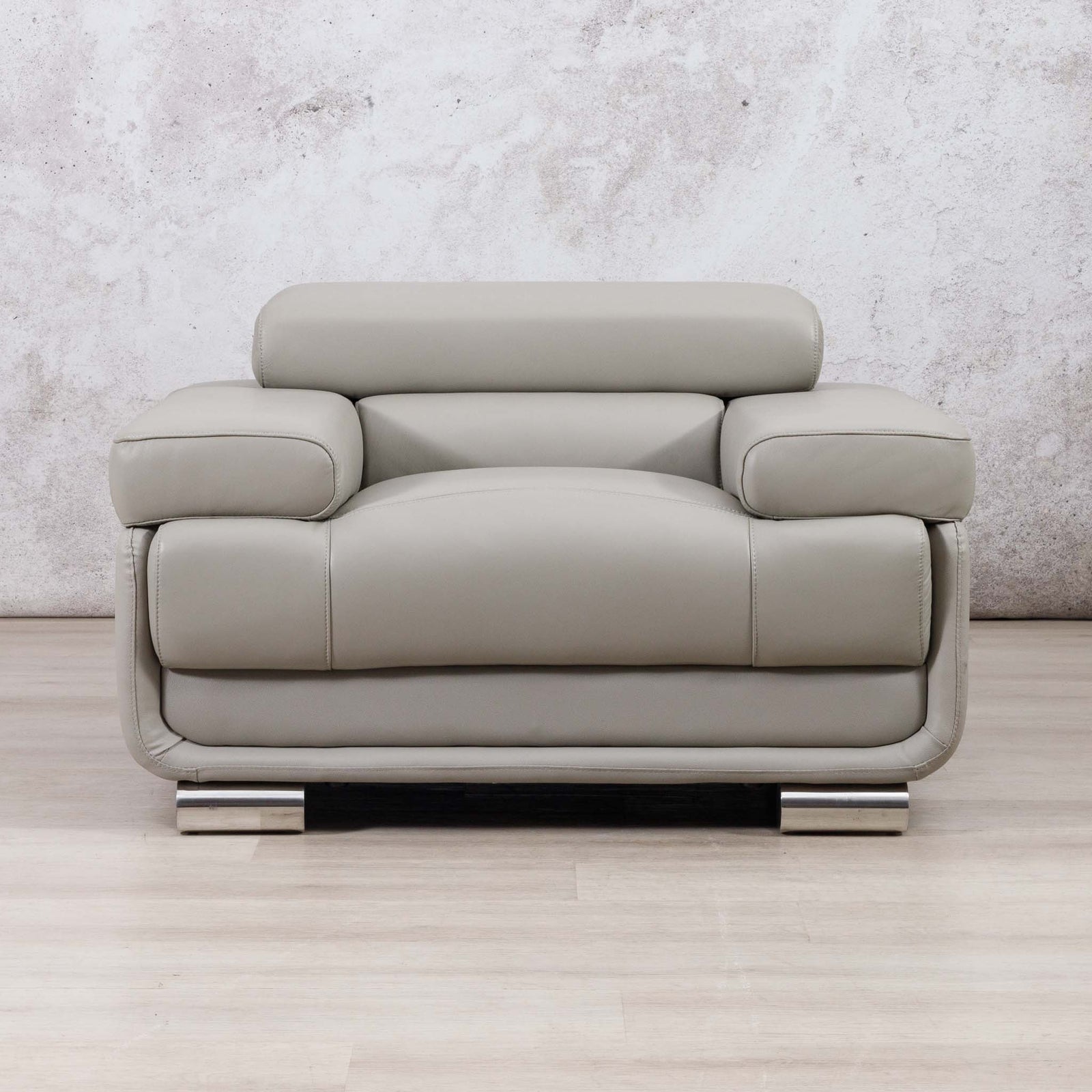 Leather Gallery Tobago 1 Seater Leather Couch in Grey, featuring polished chrome legs and a modern low-profile design.