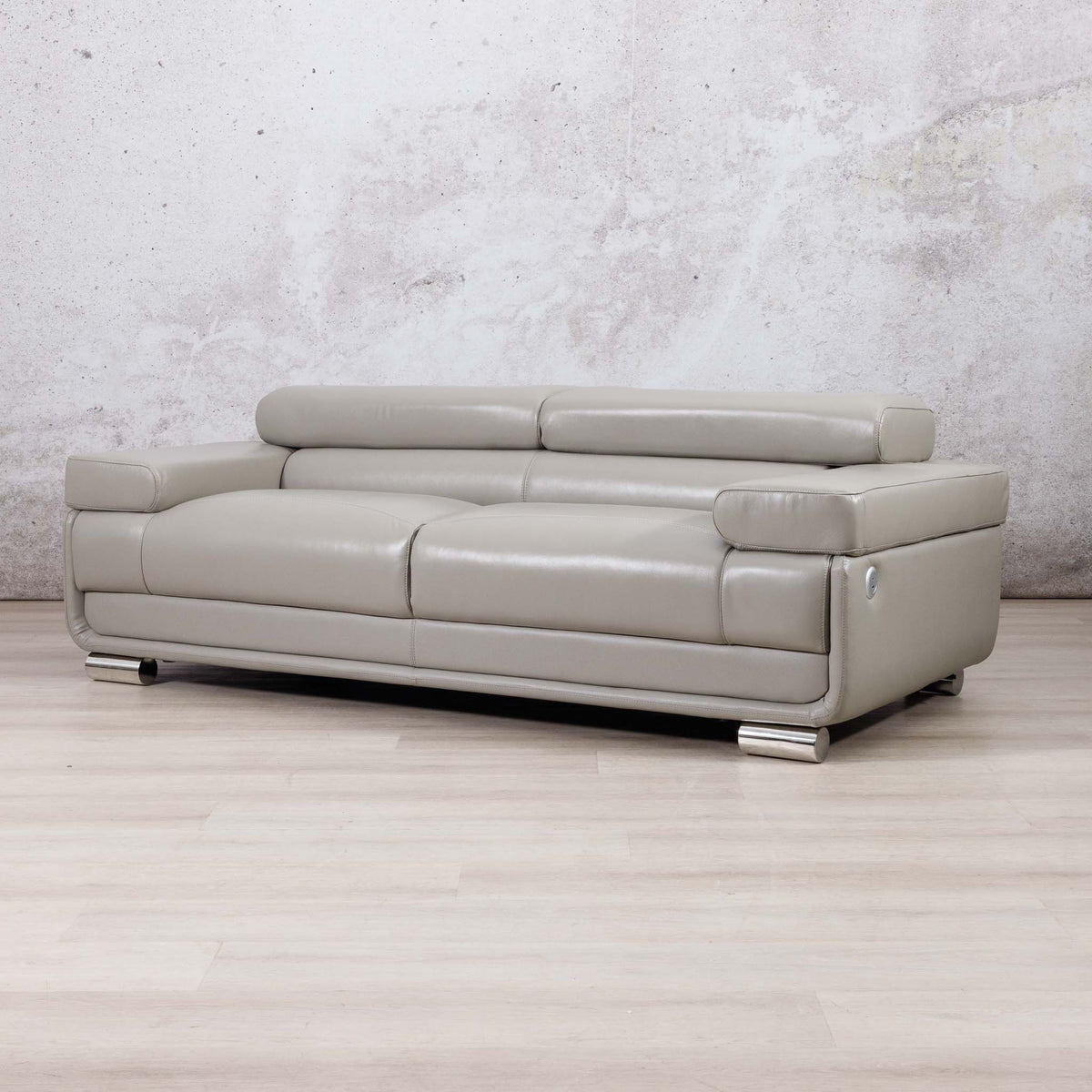 Leather Gallery Tobago 3 Seater Leather Couch in Grey, featuring light leather upholstery and polished silver metal legs.