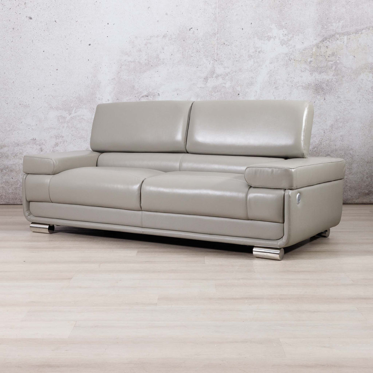 Three-quarter view of the Leather Gallery Tobago 3 Seater Leather Couch in Grey, showing its modern leather upholstery and low-profile design.