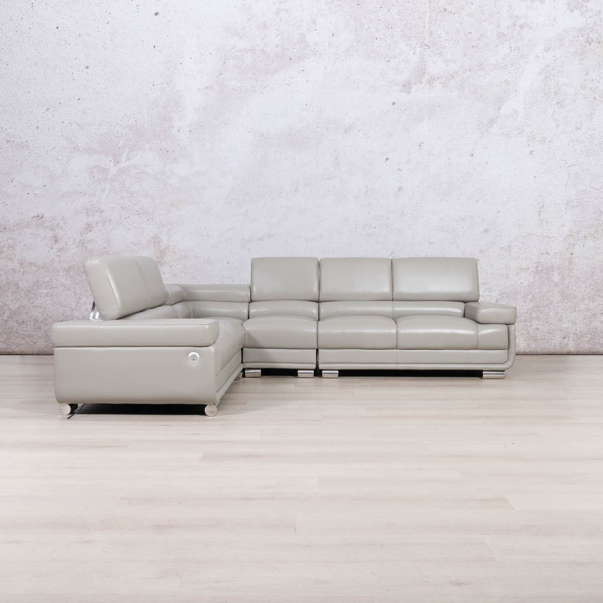 Leather Gallery Tobago 5 Seater Leather L Shape Couch in Grey, featuring an attached chaise lounge and smooth leather upholstery.