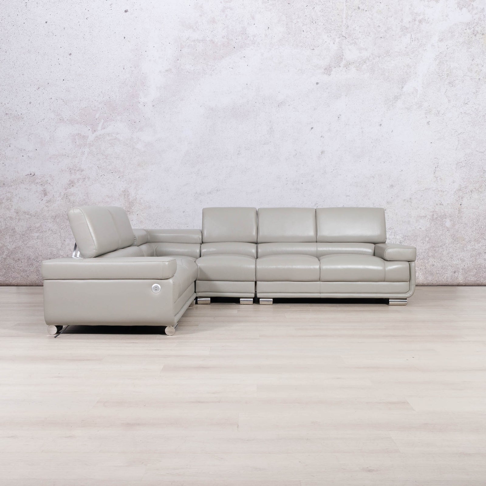 Leather Gallery Tobago 5 Seater Leather L Shape Couch in Grey, featuring an attached chaise lounge and smooth leather upholstery.