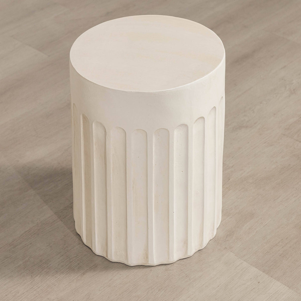 Gallery Everyday Travolta Side Table in Aruba Sand, featuring a cylindrical fluted design in a warm cream finish.