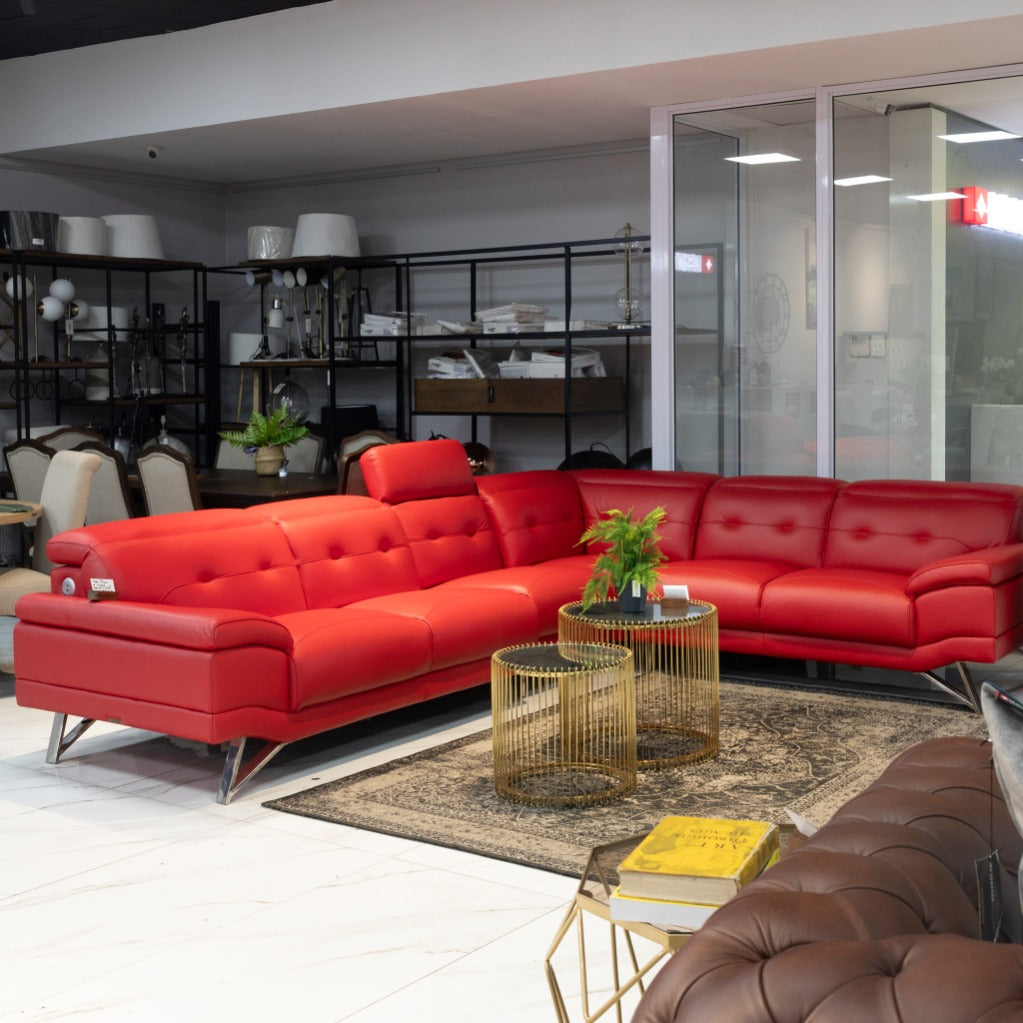 Leather Gallery San Pablo Leather Sectional in red, styled in a modern interior with glass tables and decorative accents.