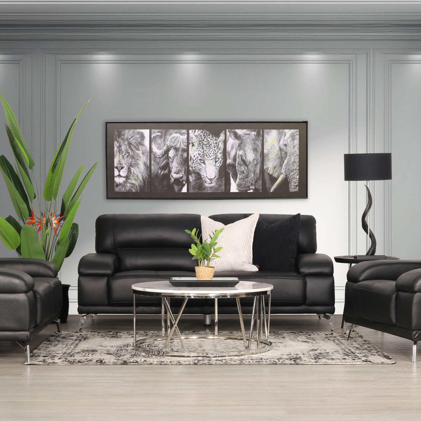 Adaline 3+2+1 Lounge Suite in luxe black coloured leather, shown in an eclectic living room interior. | Leather couches, couches for sale, three seater sofa, couches south africa 