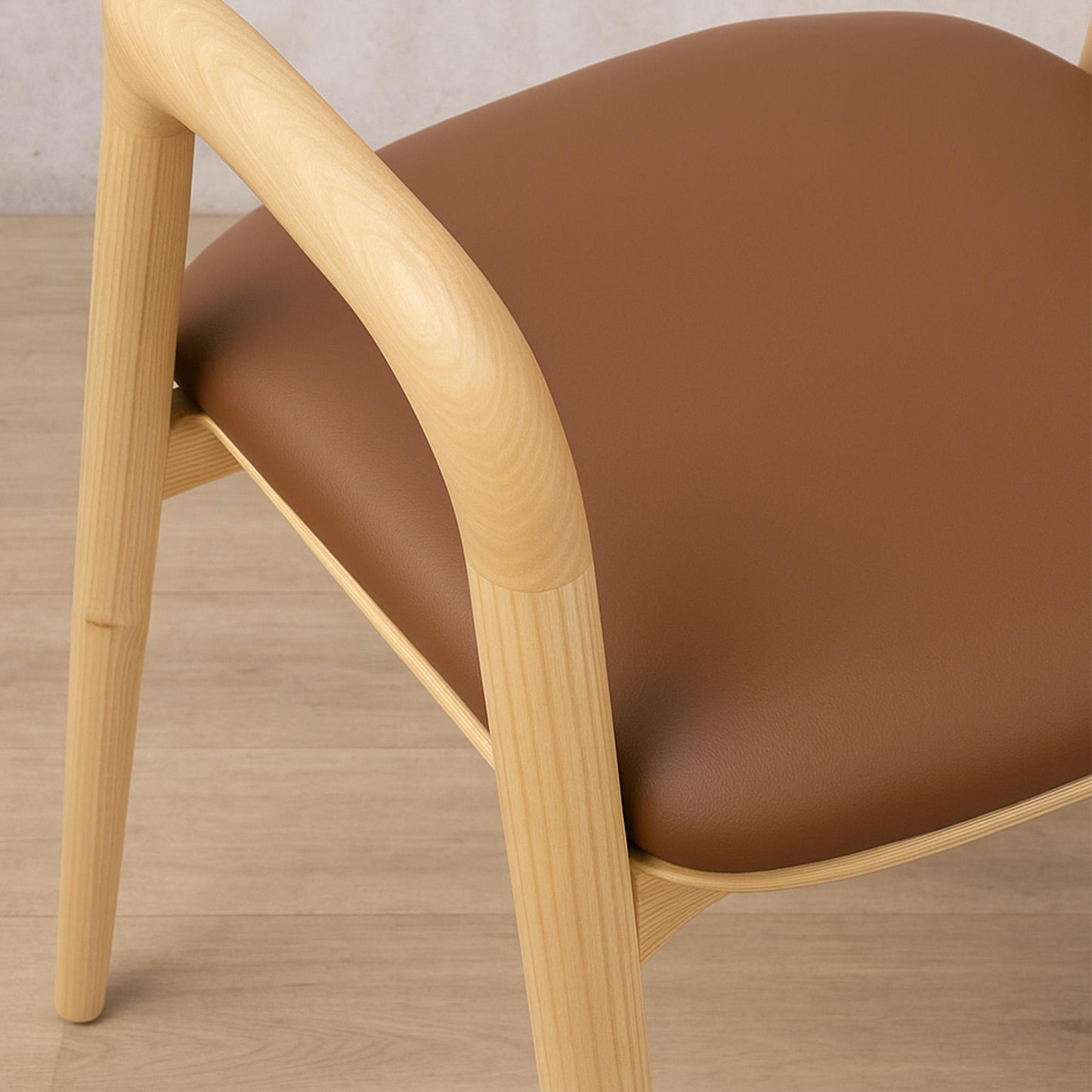 Macro view of the smooth ash wood frame and joinery on an Alaric leather dining chair. wooden dining chairs, modern dining chairs south africa 