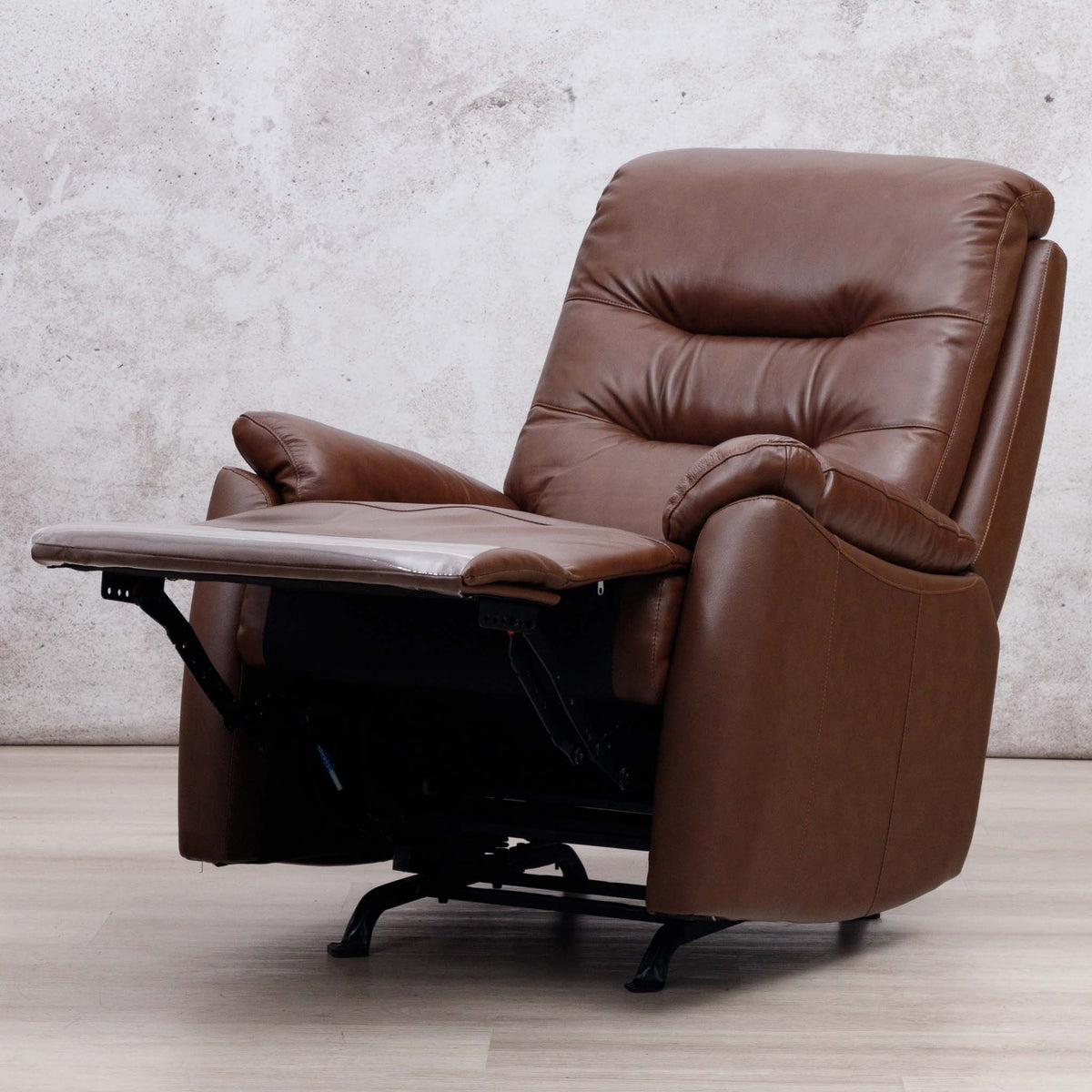 Leather Gallery Dallas Leather Rocker Recliner Chair in Saddle, shown in a reclined position with the footrest extended.